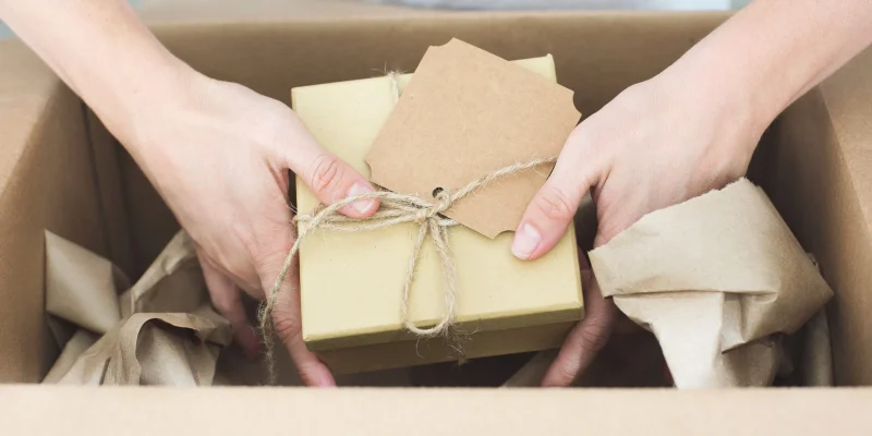 Subscription box being packed for recurring Shopify subscriptions delivery
