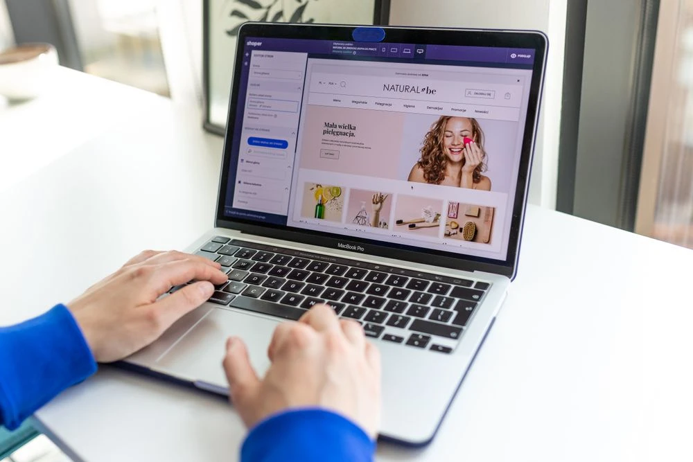 Laptop with ecommerce website open — UI Branding